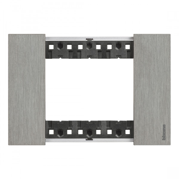 Plaque de finition Living Now Collection Les Noirs matière zamak 3 modules - finition Acier