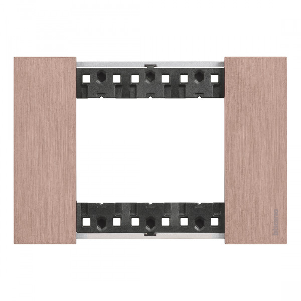 Plaque de finition Living Now Collection Les Sables matière zamak 3 modules - finition Cuivre