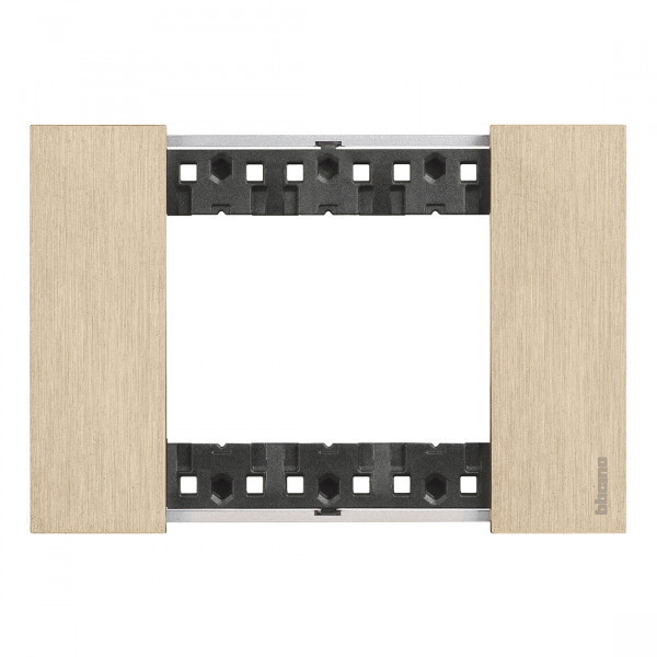 Plaque de finition Living Now Collection Les Blancs matière zamak 3 modules - finition Or