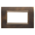 Plaque lux rect. métal 4p laiton antique