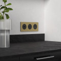Odace métal - plaque de finition 3 postes - effet laiton support noir